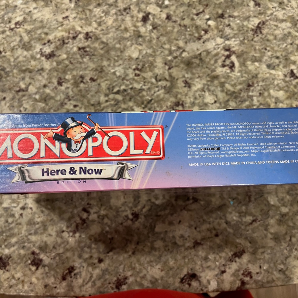 Monopoly Board Game Here & Now Edition 2006 Parker Brothers. Box never opened.